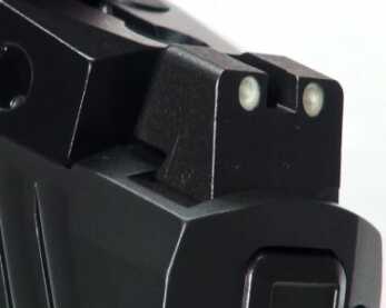 Sig's New P320RX Competition & Defense Pistol—Full Review The steel sights are the perfect height to co-witness and serve as backups.