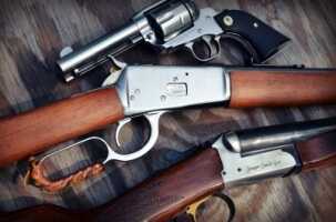 Stoeger Coach Gun Supreme. Pistols: Ruger SASS New Vaquero. Rifle Rossi 1892.