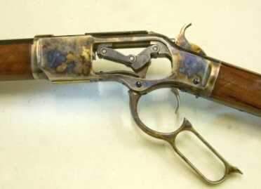 Cowboy Time Machine: Uberti 1873 Carbine—Better Than The Original? Full Review. Toggle-link action open, with sideplate of the rifle removed. Note the attractive finish on the receiver.
