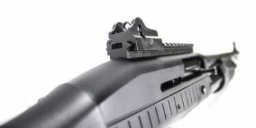 Hybrid Pump/Semi-Auto Scattergun? The TriStar TEC-12—Full Review. The rear sight is a heavy-duty ghost ring system situated behind a strip of Picatinny rail.
