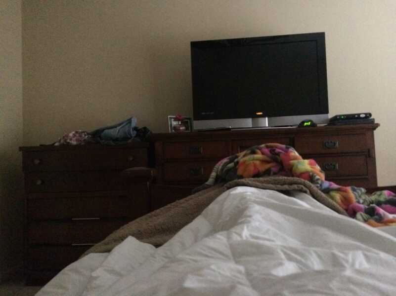 I'm literally in bed in this situation. I'm on the left side of the bed. To my left is the nightstand, and the door to the apartment and the door to the closet. In front of me is the dresser. 