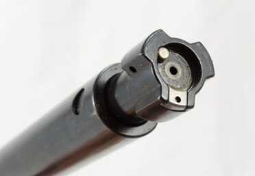 The bolt locks with three large lugs. 