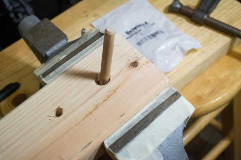 Reloading: To Crimp or Not to Crimp, That is the Question Can we agree that "crimping" this dowel into place with a vise isn't going to be effective no matter how much we squeeze the vise?