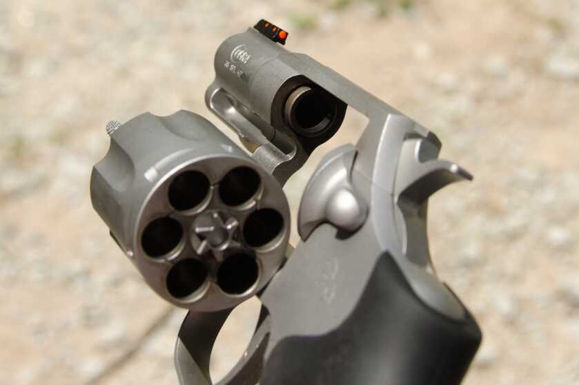 Open cylinder of the six-shot Colt Cobra loaded for .38 Special ammunition