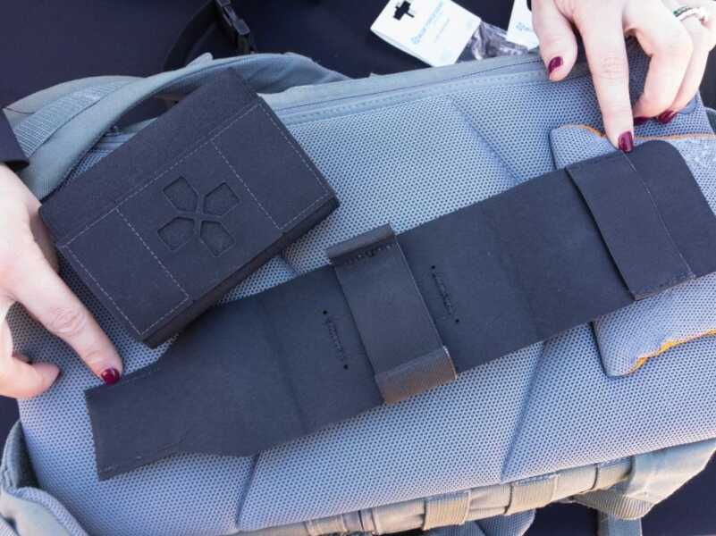 Using the fold-open sleeve, all gear from either kit fits into the small pack in the upper left.