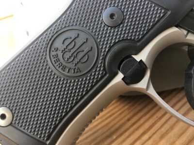 The contrast between the brushed stainless and aluminum and black looks great on this pistol. 