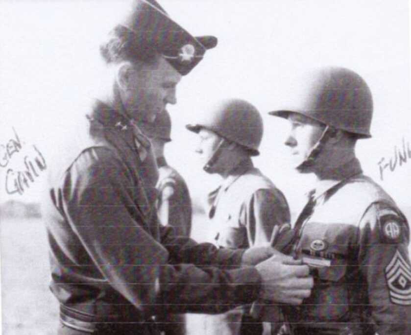 Leonard Funk decorated by General James Gavin after extraordinary airborne combat service