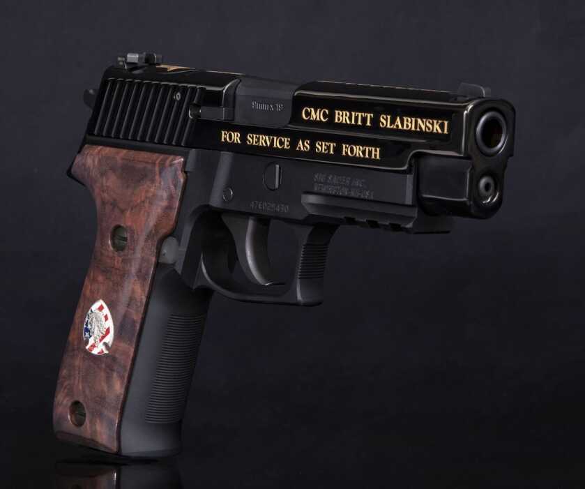 Medal of Honor Recipient Receives Commemorative MK25 Pistol from SIG Sauer