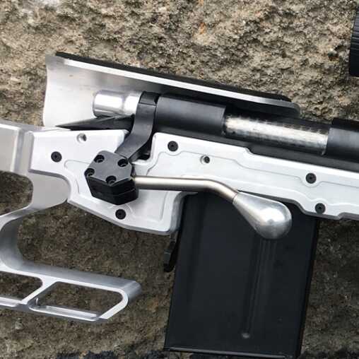 MK Machining's Original MK1 Bullpup Chassis Reviewed & New MK2 Chassis Revealed the bolt extension can be seen up close here. This add on that is included with the chassis brings the bolt handle further forward and closer to the shooter's reach.