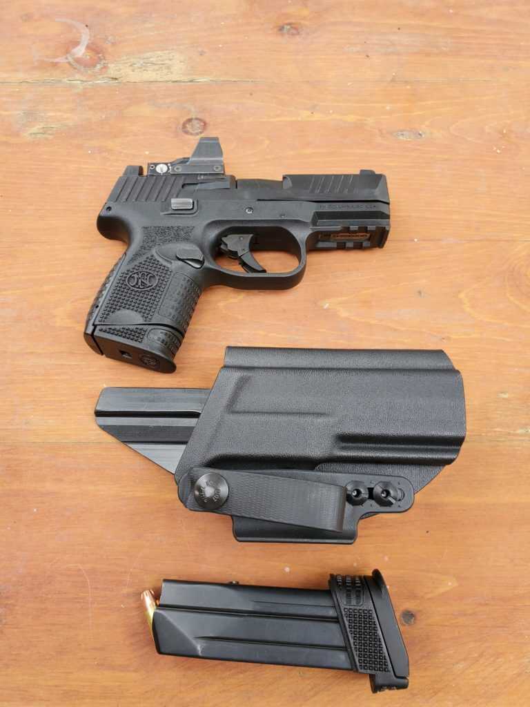 5 Reasons to Carry the FN 509 Compact MRD FN 509 MRD with Holster and Red dot