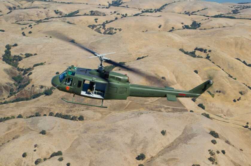 When a CIA Huey Won a Dogfight with a Communist Biplane When a CIA Huey Won a Dogfight with a Communist Biplane