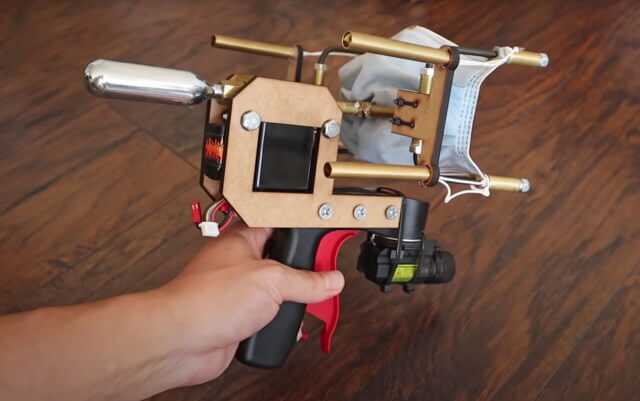 Mask Gun Shoots Medical Masks Onto People’s Faces Mask Gun Shoots Medical Masks Onto People’s Faces