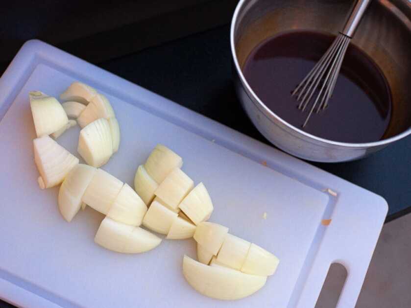 Vegetable and Sauce Prep for Beijing Bear Sliced onions and peppers with sweet and spicy sauce ingredients for Beijing bear