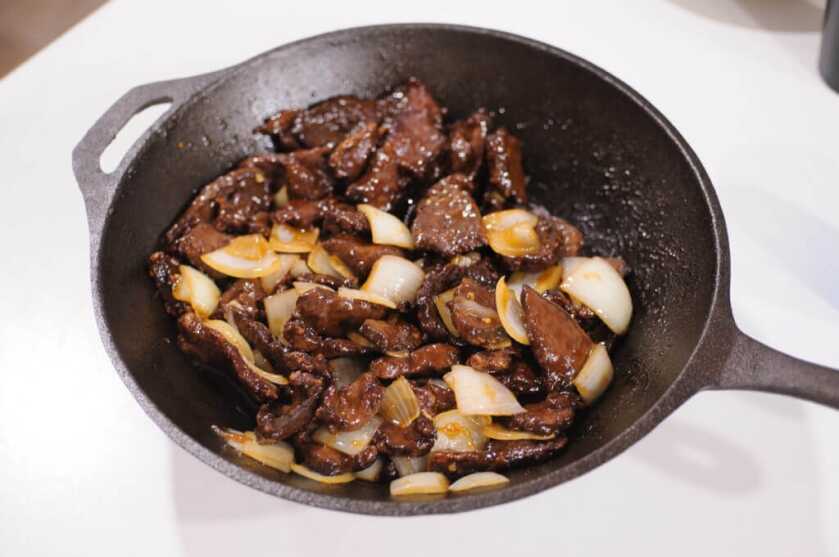 Finished Beijing Bear Wild Game Meal Finished Beijing bear meal with crispy wild game, peppers, onions, and sweet spicy glaze