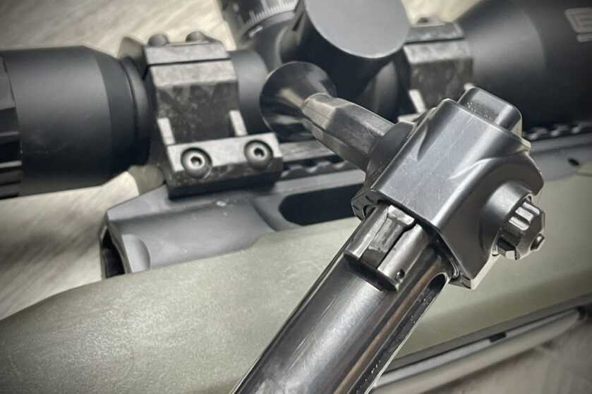 Savage Impulse Hog Hunter bolt handle cammed back and ready for receiver reinsertion