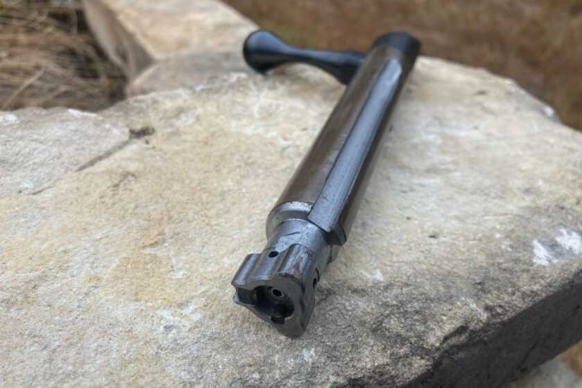 Ruger American Ranch 300 BLK: Quiet by Design Ruger American Ranch 300 BLK receiver showing the bolt, tang safety, and scope mounting area