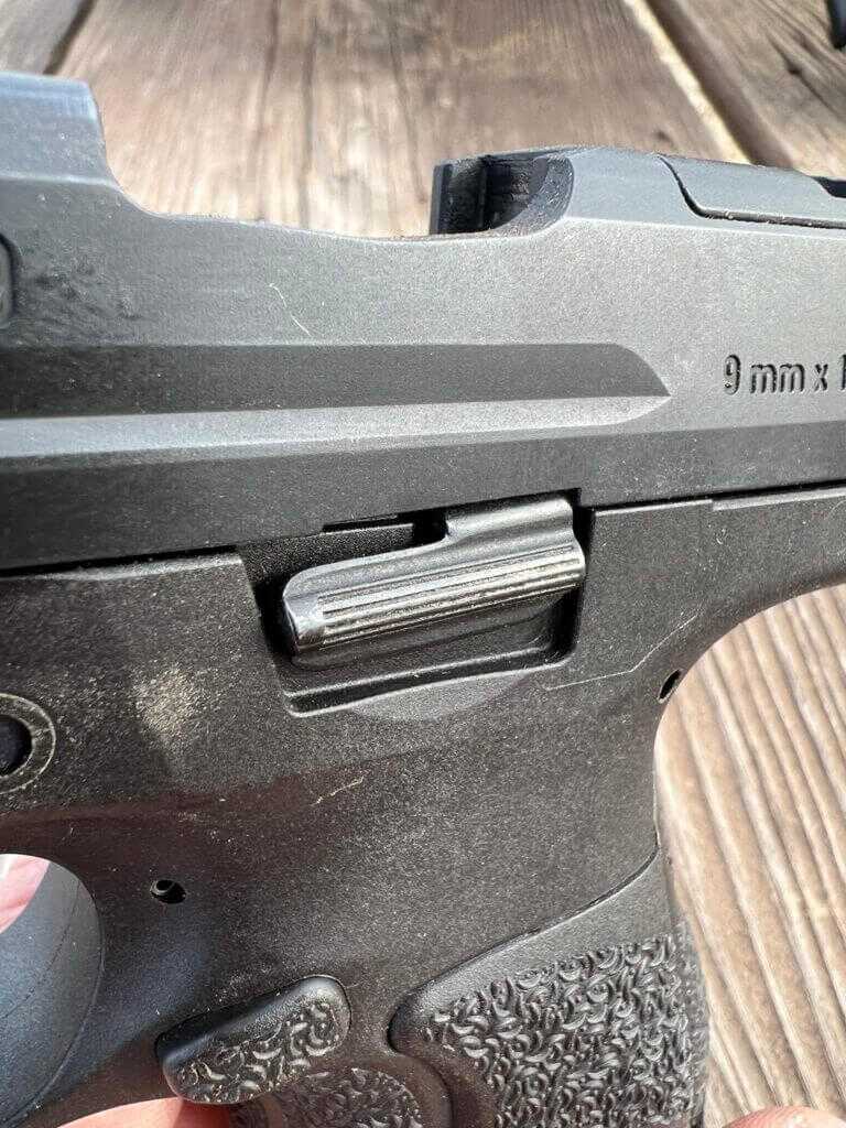 H&K VP9B slide release positioned flush with the pistol frame