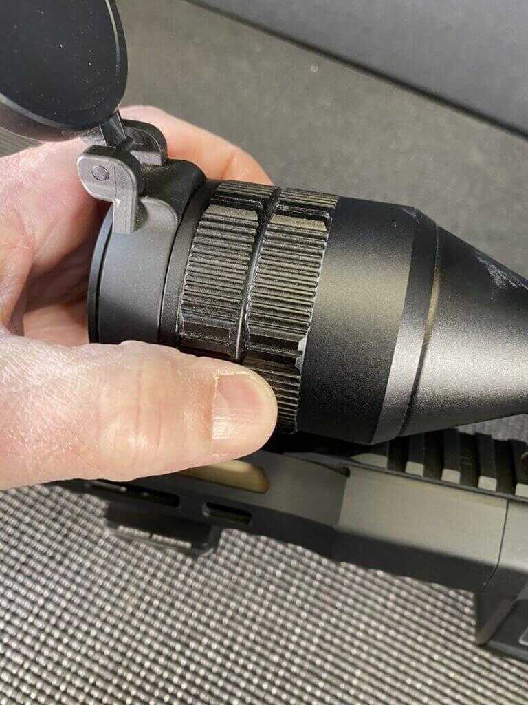 Knurled objective focus knob on the InfiRay BOLT TH50C thermal riflescope