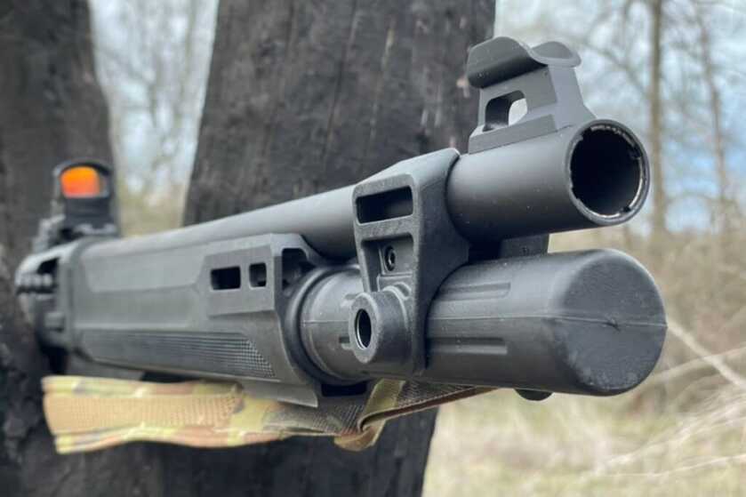 Beretta A300 Ultima Patrol in a tree with m-lok slots on handguard