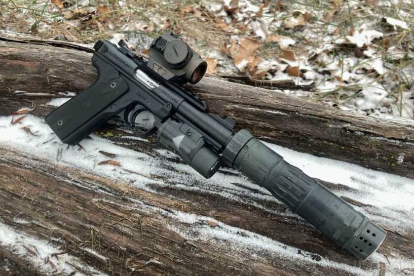 My Favorite 22 Pistol: Ruger 22/45 Tactical Ruger 22/45 Tactical with red dot, flashlight, and suppressor mounted.