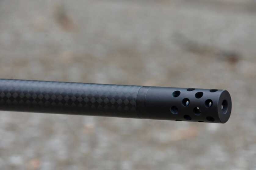 Getting Hot And Heavy With The Bergara MgLite: Full Review A closer look at the carbon fiber CURE barrel and muzzle brake on the MgLite.