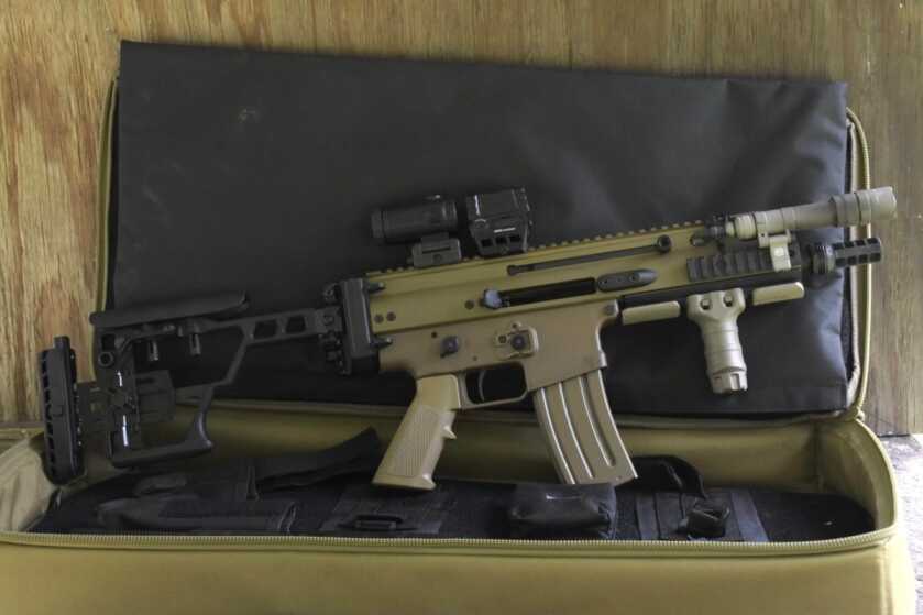 FN SCAR 15P 5.56 pistol in its soft case with SIG Cross stock and accessories