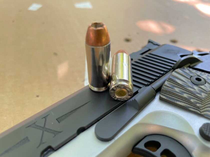 Tisas D10 1911 with X engraving on slide.