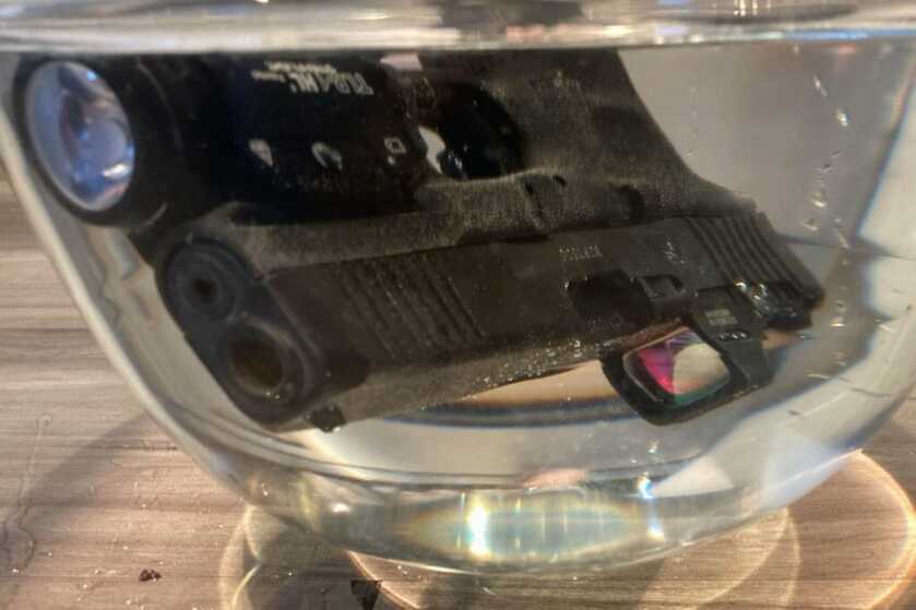 Holosun SCS MOS submerged in water to test its IP68 immersion rating