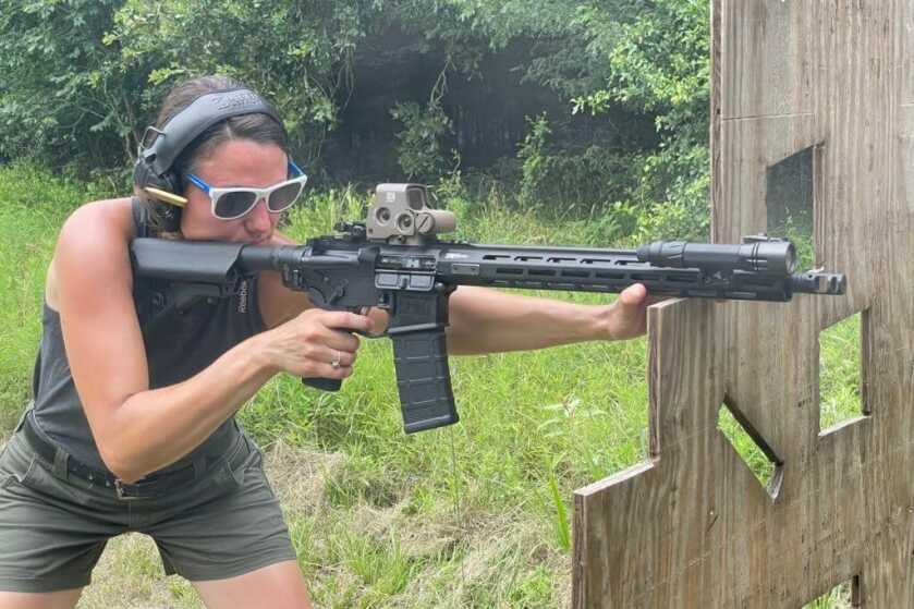 My wife running drills with the SAINT Victor using a VTAC barricade to keep things interesting 