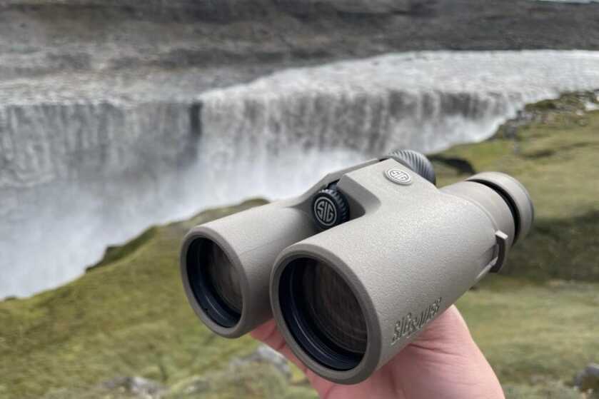2 - Nature Observation: Sig ZULU8 HDX 10x42 Binocular Review SIG SAUER ZULU8 HDX Binoculars in front of large waterfall