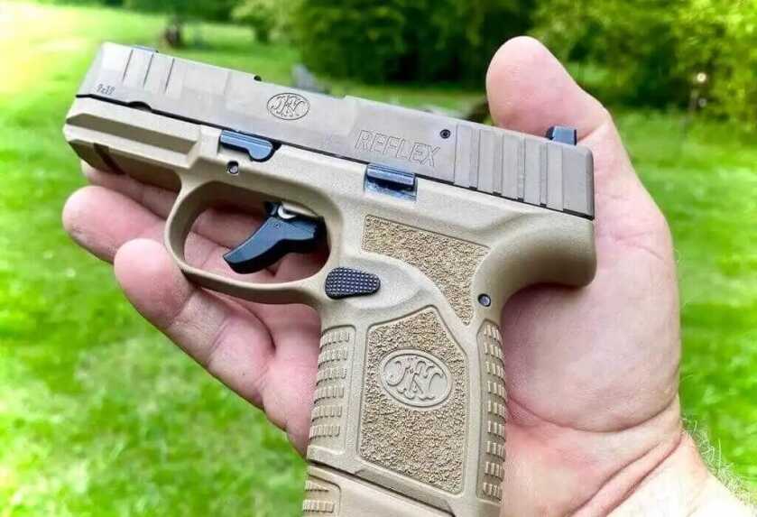 Palm-sized FN Reflex 9mm micro compact measuring 6.2 inches long and 4.27 inches tall