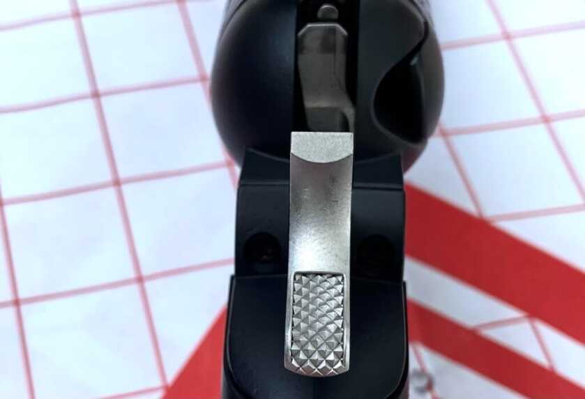 0 -- One Gun, Two Rimfires: Ruger’s Super Wrangler checkered spur for cocking the hammer of a revolver