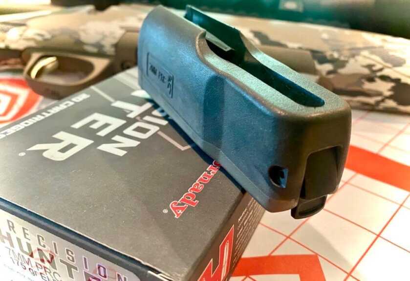 Browning X-Bolt Speed SR 7mm PRC three-round rotary magazine resting on Hornady ammunition
