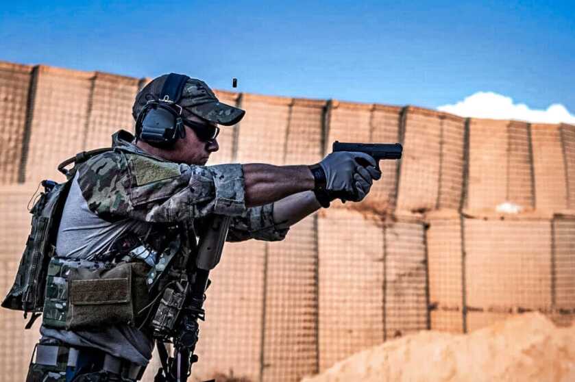 3 - The Best Modern Combat Proven Handguns, Shotguns, and Rifles U.S Airforce man shooting pistol