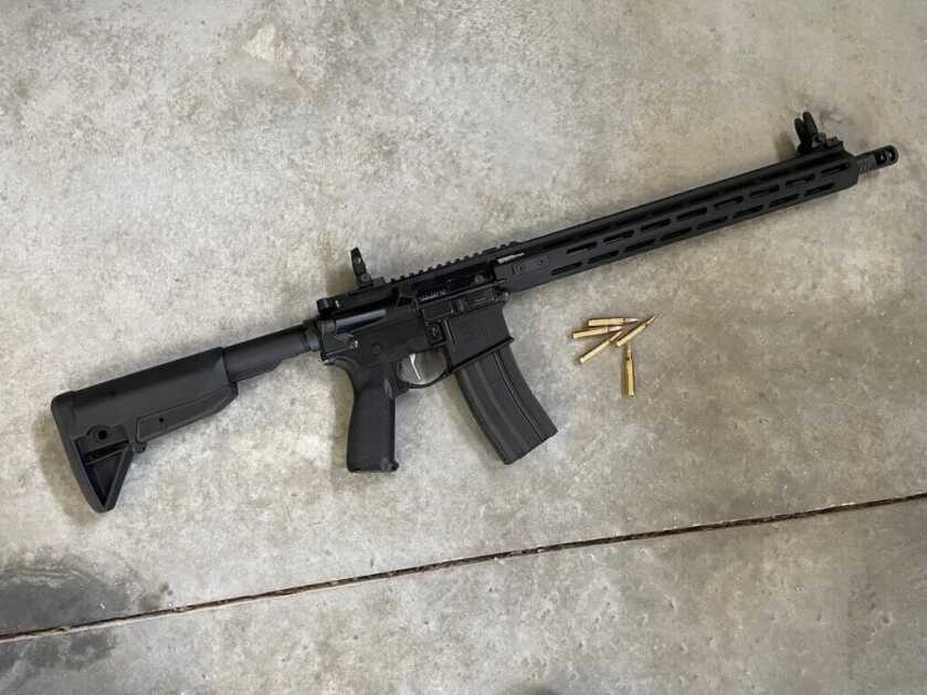 Springfield Armory Saint AR15 with ammo.