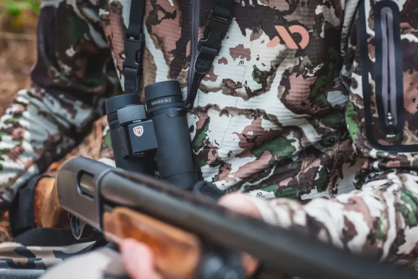 3 -- Go Small or Go Home! Maven’s Compact B.3 Binoculars Are Superstars Maven compact B.3 binoculars hanging from hunter's neck