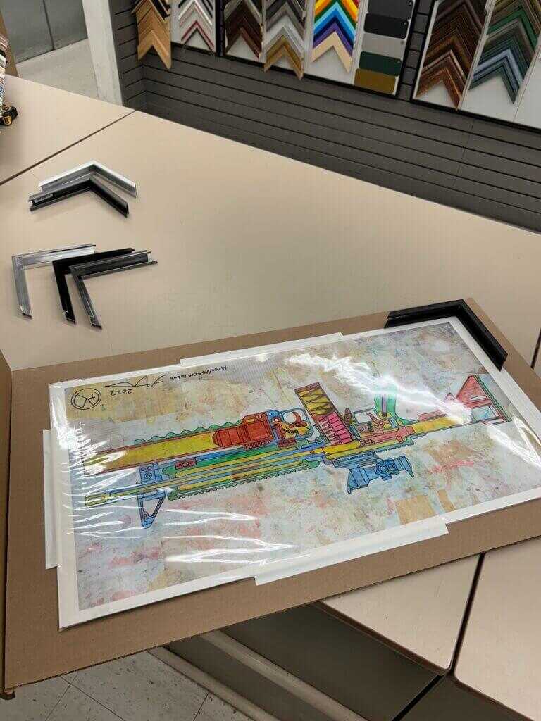 The Martinez print at the framing store.