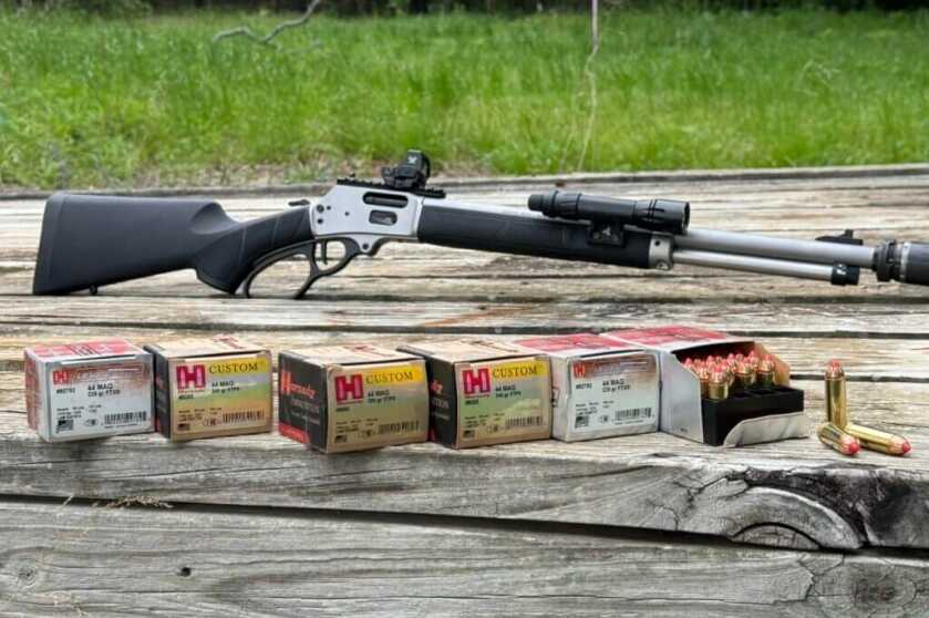 Smith & Wesson Model 1854 .44 Magnum rifle displayed with six boxes of Hornady ammunition used during accuracy testing