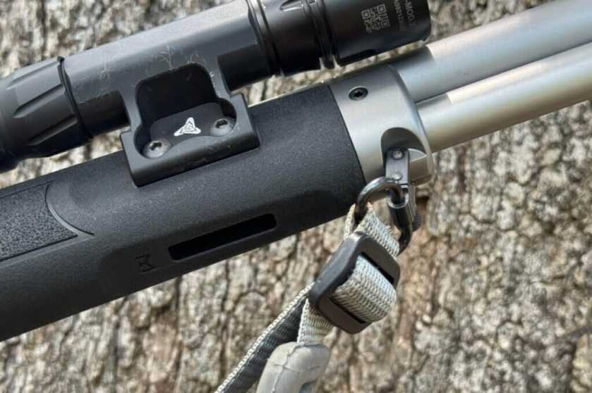 Smith & Wesson Model 1854 lever-action rifle showing the sling swivel hole machined into the metal forend cap