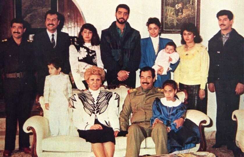 family posing for photo