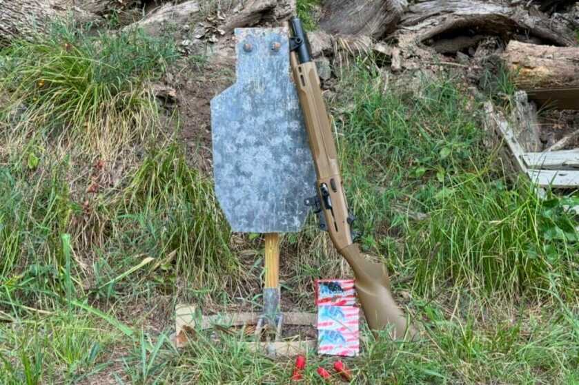 Beretta 1301 Tactical Mod.2 in front of steel target outside