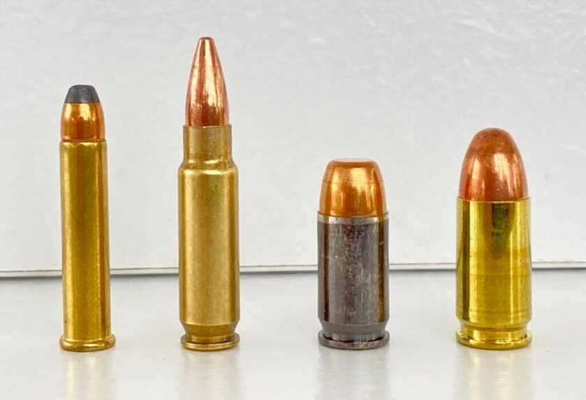4 cartridges of ammo side by side