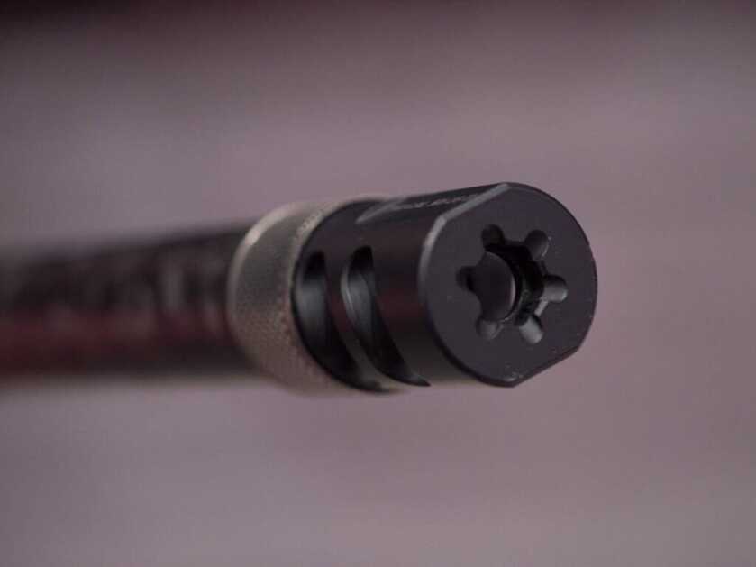 Close up of the end of the muzzle showing the brake.