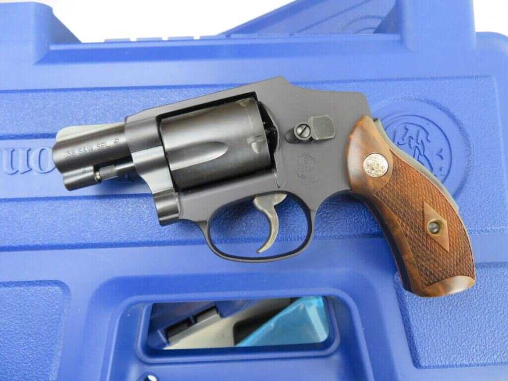 double action revolver on a blue safe case
