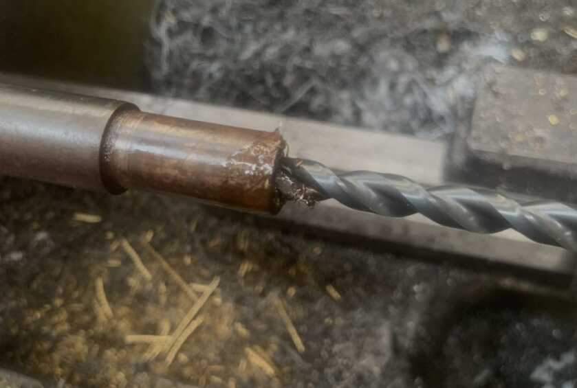Relining a Barrel, Or How to Make a Barrel Like New Again Drilling the barrel with the barrel liner drill.
