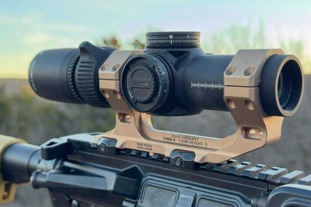 Vortex AMG 1-10x24 LPVO mounted on a modern carbine, showcasing compact 8.4 in length and 34mm tube