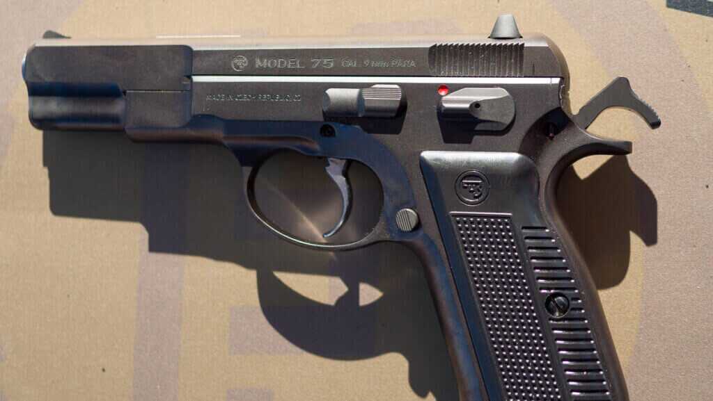 The gun's left face.