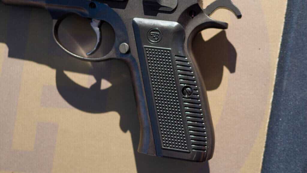 Close up view of the grip with the gun facing to the left.