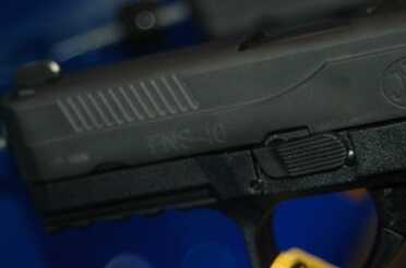 photo 2 The FNS series had forward cocking serrations, ambi controls, a forward mounting rail for lights/lasers, and night sights as standard.