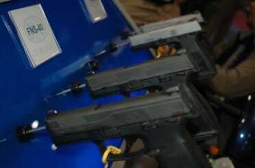 photo 3 The FNS-9 and FNS-40 come with either a blackened or stainless slide.